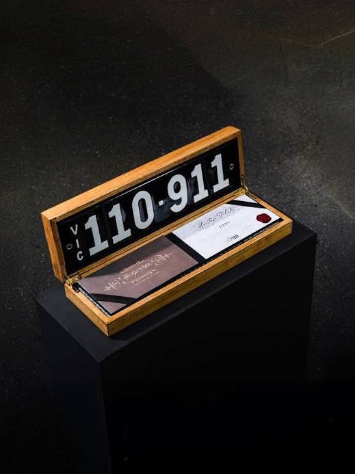 A Victorian Heritage number plate displayed in its presentation case