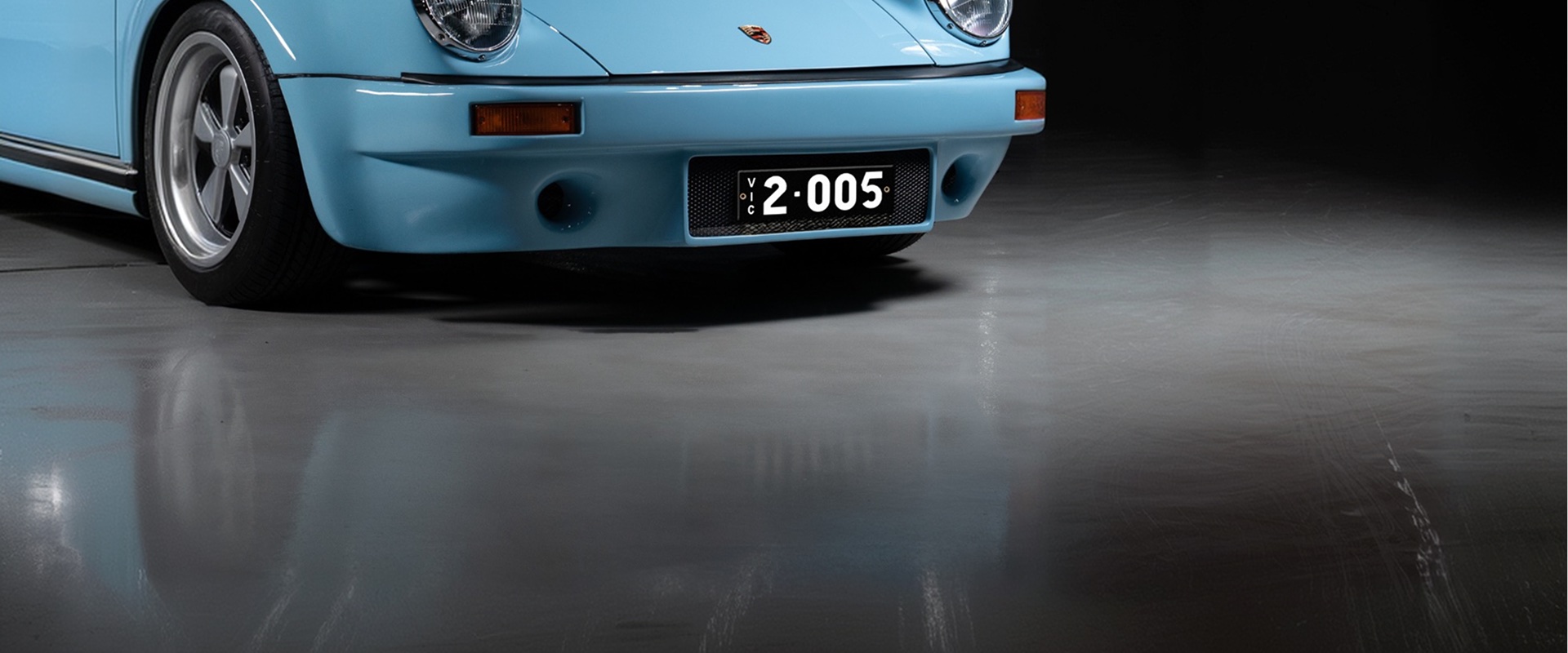 A Porsche 911 wearing a Victorian Heritage number plate