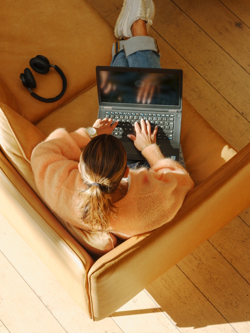 Someone reviewing a listing on a laptop