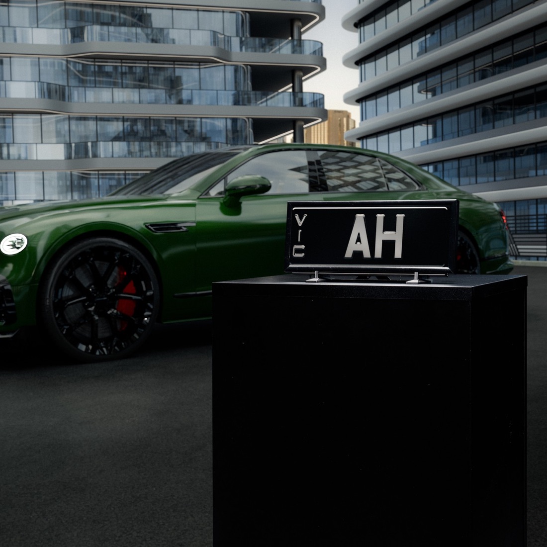 A Jaguar F-Type displayed beside its heritage number plate